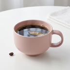 Tasse à café en céramique rose poudré – Design élégant et arrondi