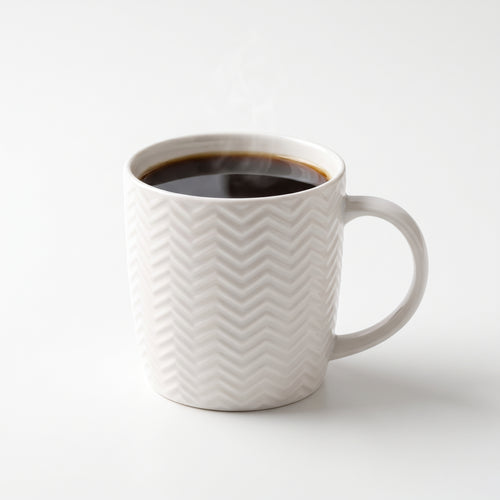 Tasse à café blanche en céramique texturée – Motif chevron élégant